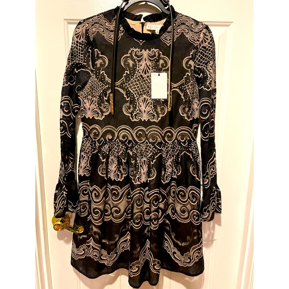 Black and cream dress with belt at waist never worn!